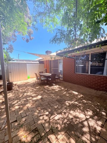 This well-maintained two-bedroom, one-bathroom home! - Photo 2