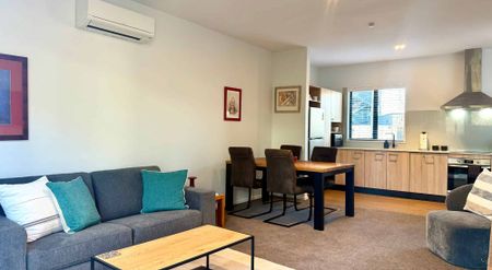 IMMACULATE FULLY FURNISHED INNER CITY APARTMENT! - Photo 3