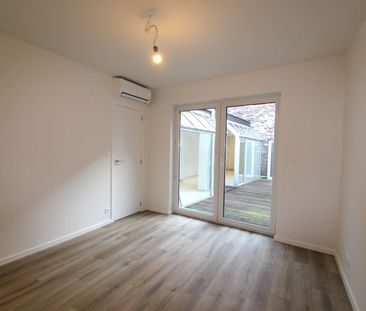 GELIJKVLOERS APPARTEMENT IN HET CENTRUM - Photo 3