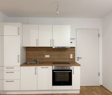 Helle 2 Zimmer Wohnung mit Balkon - ERSTBEZUG - Foto 4