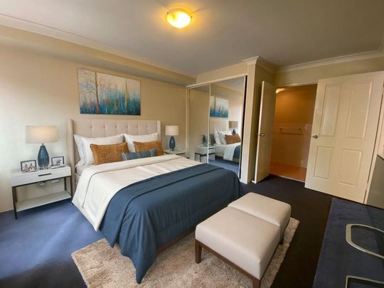 Spacious & Modern Apartment in a Secure, Ultra-Convenient Location - Photo 1