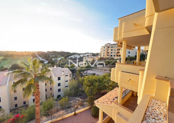 Noble luxury. Two bedroom apartment in a quiet urbanization overlooking the sea and golf cour