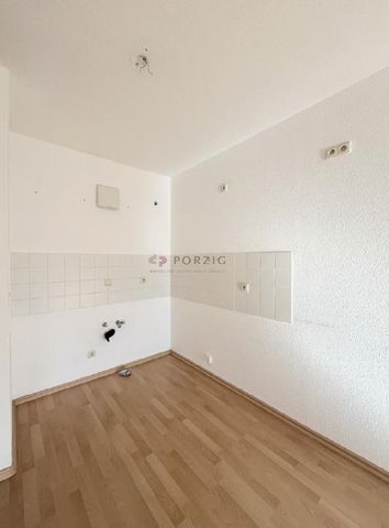Sonne, Komfort, kurze Wege: 2-Zimmer-Wohnung mit großem Balkon, Aufzug & Tiefgarage - Foto 4