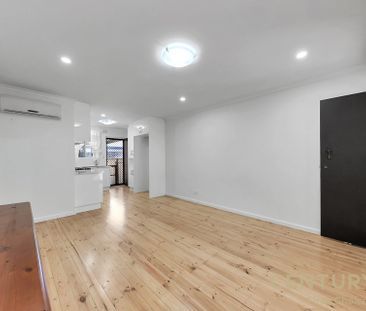 Bright and Modern | Ideal Location | Low Maintenance - Photo 2