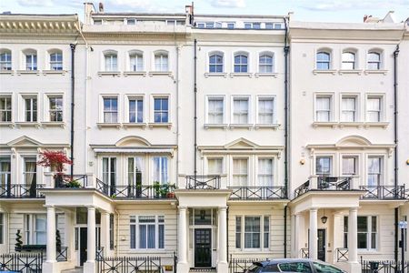 A modern and recently refurbished two / three bedroom lateral apartment boasting a spectacular reception room with 3.3m high ceilings - Photo 4