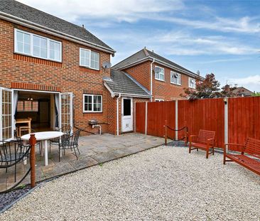 A modern three bedroom home with garage and off-street parking in a... - Photo 4