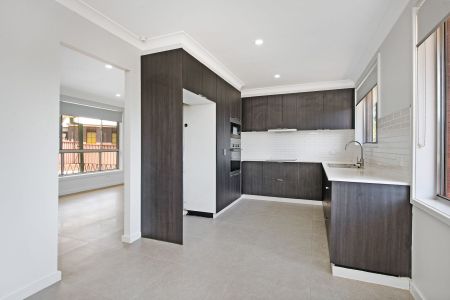 TASTEFULLY RENOVATED HOME WITH AMPLE PARKING AND STORAGE - Photo 2