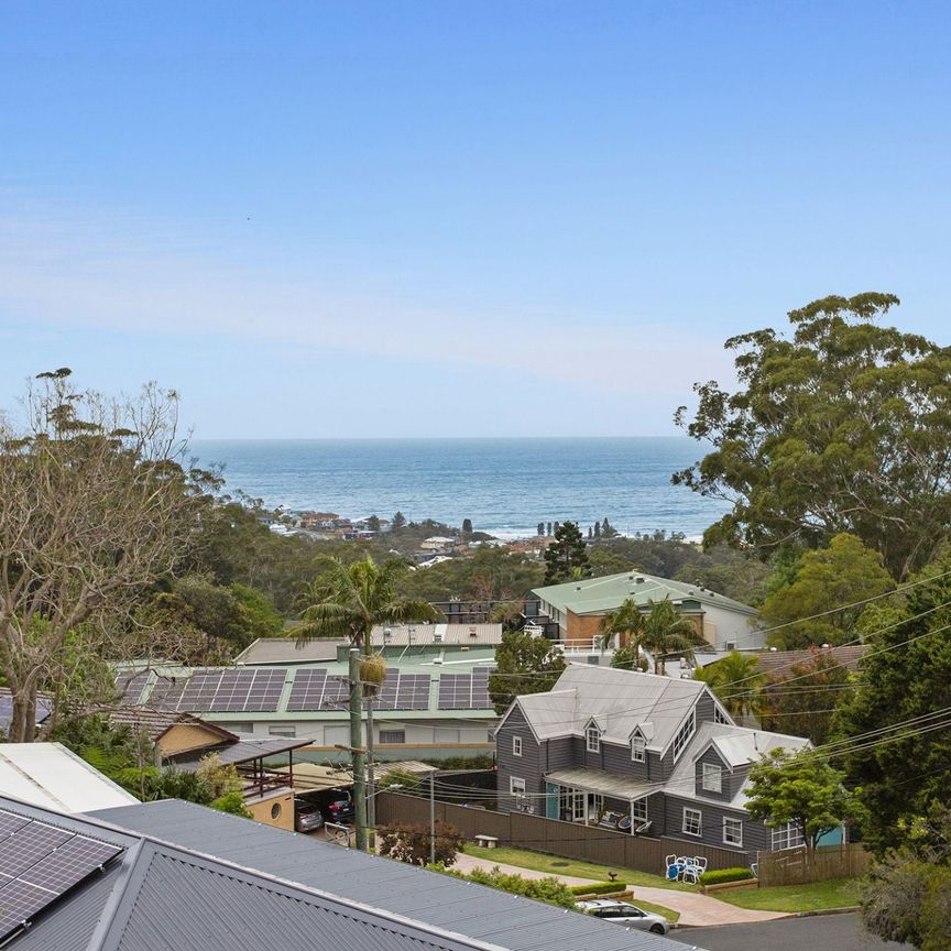 Laid Back Coastal Comformt In Exclusive Location - Photo 1