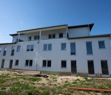 Eine Neubauwohnung mit einem sehr großen Garten und einer tollen Te... - Photo 5