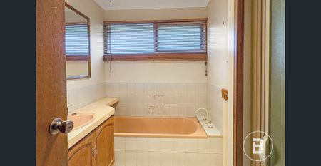 Spacious Home with Two Livings and New Carpet - Photo 3