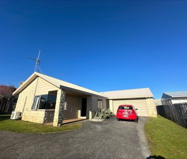 Tucked away in Forest Lake, this charming three-bedroom home awaits... - Photo 4