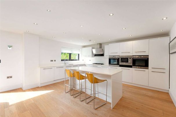Stylish ultra-modern home with cinema, garden room and impressive home technology, on quiet Hale Barns cul-de-sac - Photo 1