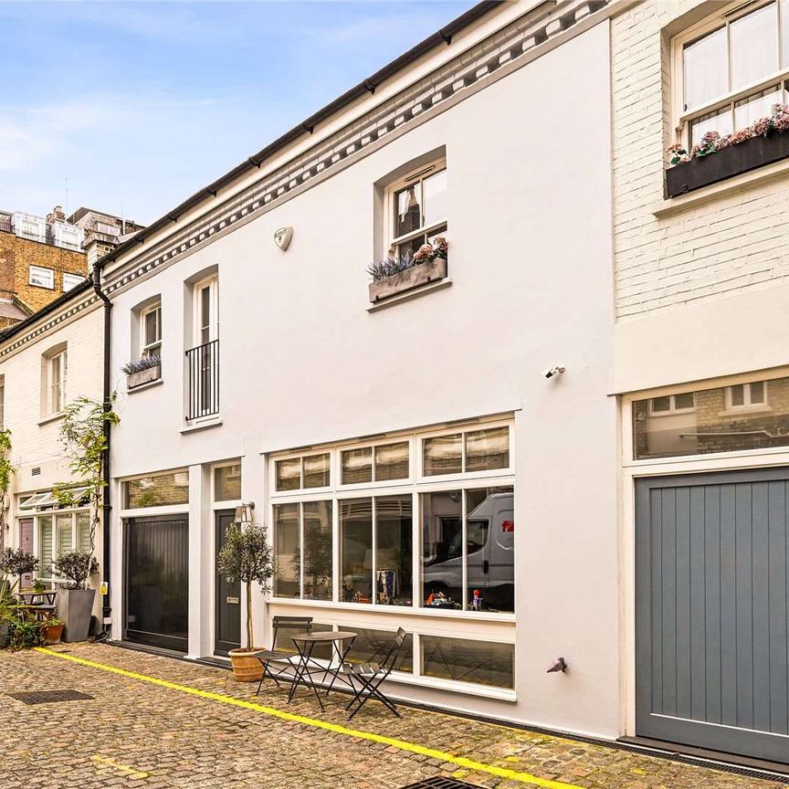 A newly refurbished mews house with contemporary fixtures, fittings and furnishings on a quiet residential street in South Kensington. - Photo 1