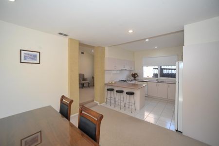 Immaculate Home with Spacious Layout, Modern Amenities & Prime Location - Photo 5