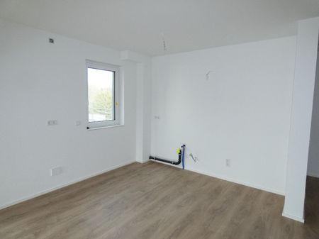 Neubau/Erstbezug: Moderne 4-Zimmer-Wohnung mit eigenem Garten! - Photo 2