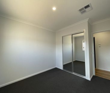 FOUR BEDROOM HOME - LOW MAINTENANCE! - Photo 3