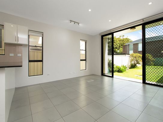 Four-Bedroom Duplex Close to Beach - Photo 1