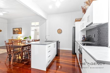 Stunning Queenslander with Modern Comforts and Spacious Outdoor Living! - Photo 3