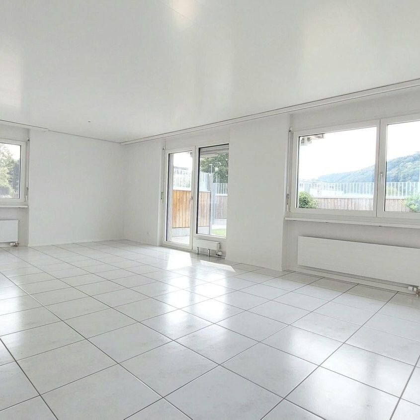TEILSANIERT: 3.5-ZW à 70 m² im EG - Photo 1