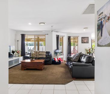 The Brief:Affordable Family Home in Helensvale: 4 bedrooms. Solar w... - Photo 1