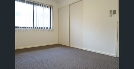 Spacious 4-Bedroom Family Home with Modern Comforts - Photo 5