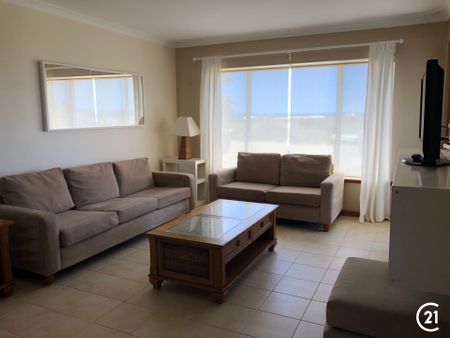 Panoramic Ocean Views in a Quiet Coastal Gem – Fully Furnished 2-Bedroom Unit - Photo 5