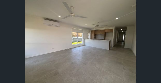 Brand New Four Bedroom Home! - Photo 1