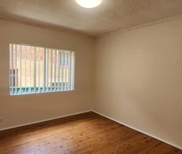 CONVENIENTLY LOCATED TWO BEDROOM UNIT - Photo 3
