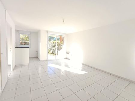 location Appartement T2 DE 40.05m² À SEILH - Photo 3