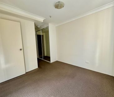 ULTRA CONVENIENT 1 BEDROOM WITH STUDY AND 2 BATHROOMS APARTMENT - Photo 1