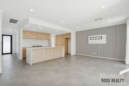 Sleek & Modern 3×2 Home with Secure Double Garage - Photo 2