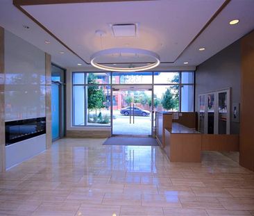 2 Bed Condo | Surrey University District | Parking • Den - Photo 4