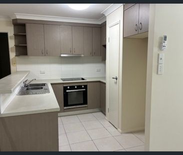 Charming Loganlea Family Home Awaits - Photo 4