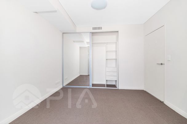 Entry via Block C,As new 1-bedroom modern apartment now for lease - Photo 1