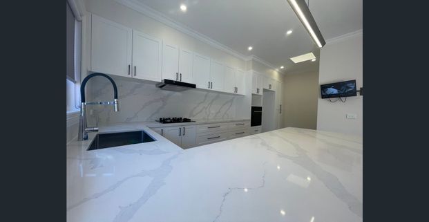 Stunning Fully Renovated Single-Level Home in a Prime Location! - Photo 1