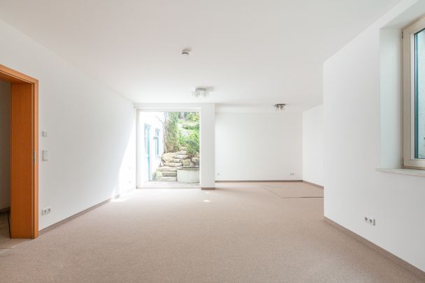 Familienfreundliche Doppelhaushälfte mit Garten, EBK und Doppelgarage in ruhiger Lage - Photo 1