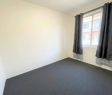 Spacious and Modern - Photo 2