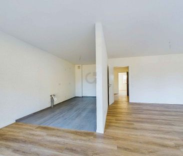 Neuwertige und modern ausgestattete Etagenwohnung mit Sonnenbalkon. - Foto 1