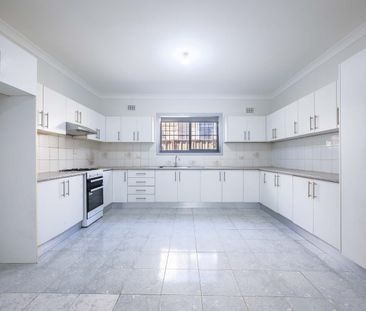 Comfort Meets Convenience: Three Bedroom Home in Prime Location - Photo 2