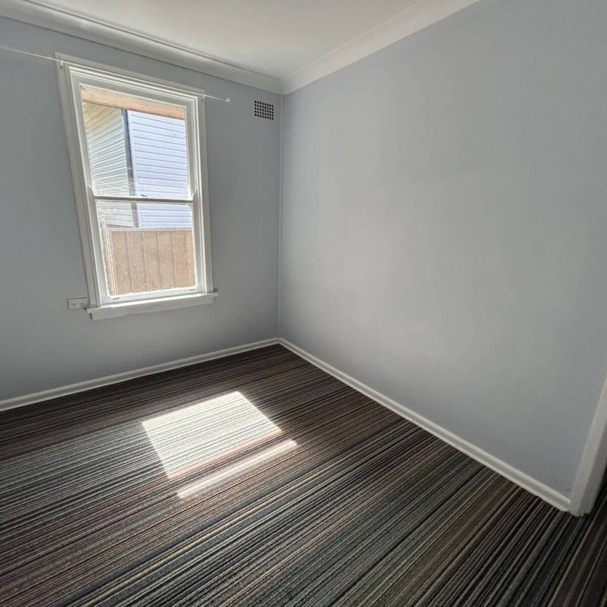 NEAT & TIDY THREE BEDROOM HOME - Photo 1
