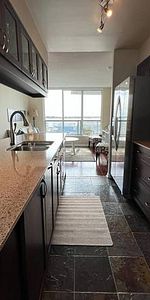 Elegant 2 Bed 2 Bath with 2 Balconies and Stunning Water Views - Photo 4