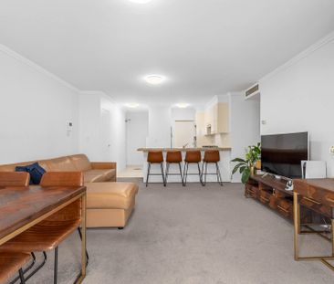 Sleek 2-bedroom apartment in a resort style complex - Photo 1