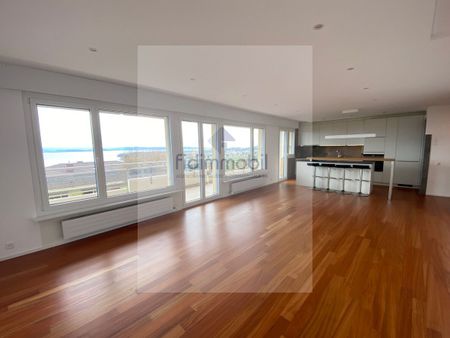 FULLY RENOVATED APARTMENT WITH STUNNING LAKE VIEWS - Photo 3