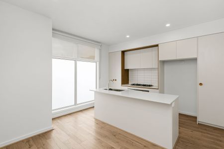 Charming 3 level, 3-Bedroom Home with Modern Comforts in South Morang - Photo 4