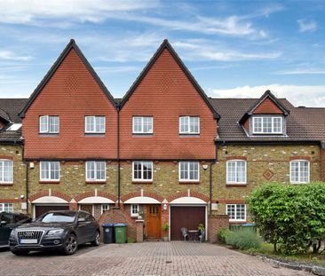 A well presented four bedroom townhouse situated in the heart of Cobham Town centre. - Photo 3