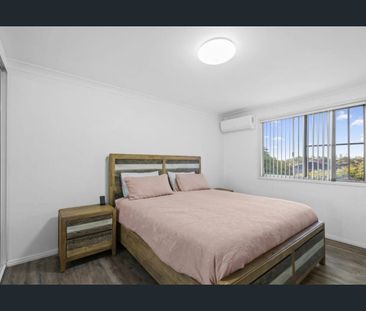 Stylish Two-Level Living in a Prime South-East Location - Photo 6