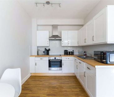 A first floor one bedroom apartment centrally located on the High S... - Photo 5
