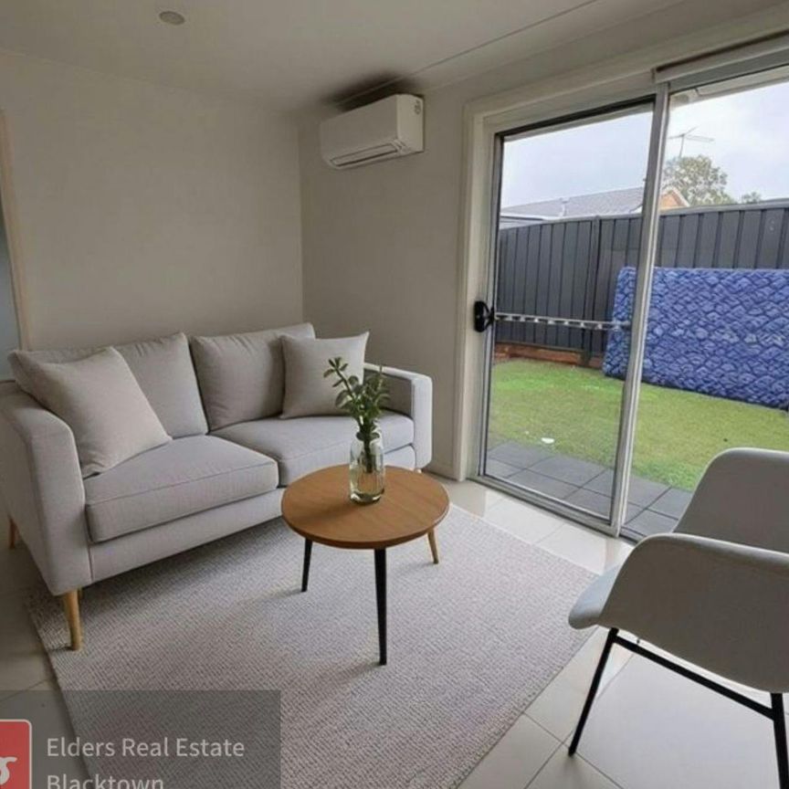COZY FAMILY HOME IN CONVENIENT LOCATION! - Photo 1
