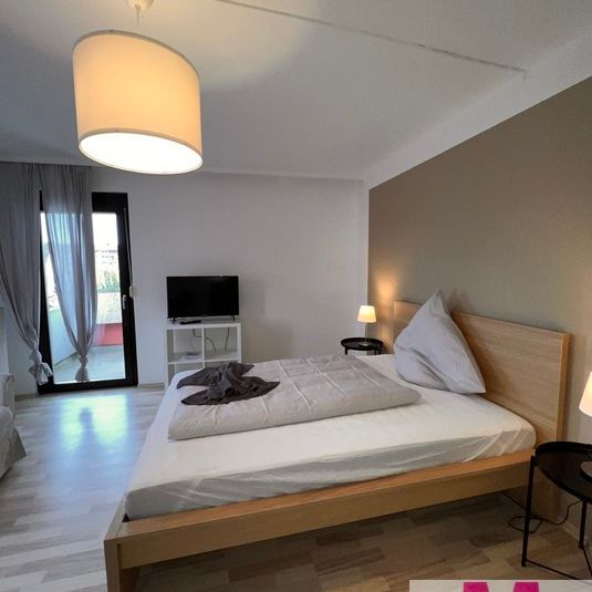 Gepflegte, möblierte Wohnung in zentraler Lage - Foto 1