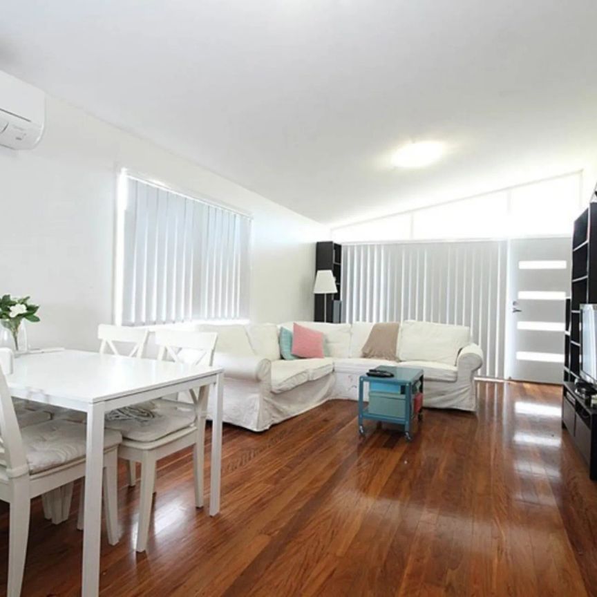 Charming Home with High Ceilings and Modern Comfort - Photo 1